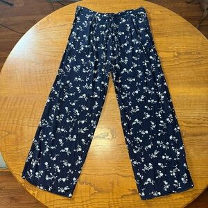 Navy blue pants with white floral pattern